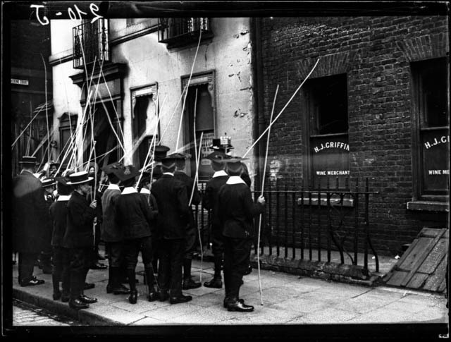School children participate in the annual 'beating the bounds' ceremony near Tower, date unknown. 