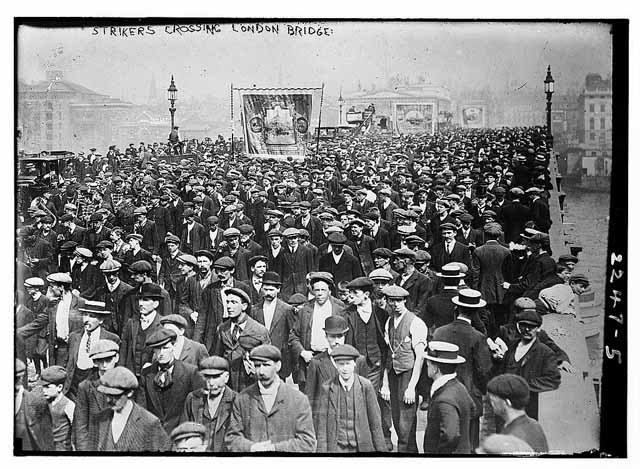 Dock strikers march over London Bridge, 1911. 