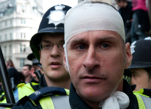 An injured policeman / image by Daniel_C_C 