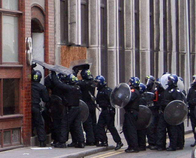 Riot police storm the a building in Earl Street on Thursday / image by Tanya N 