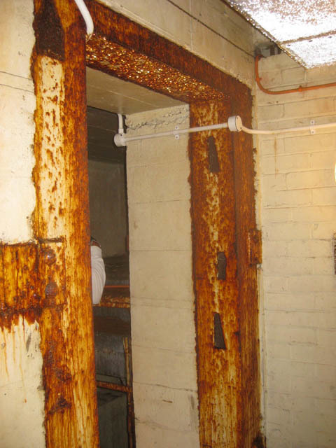 The solid frames to blast doors are still in place, but rusting badly. 