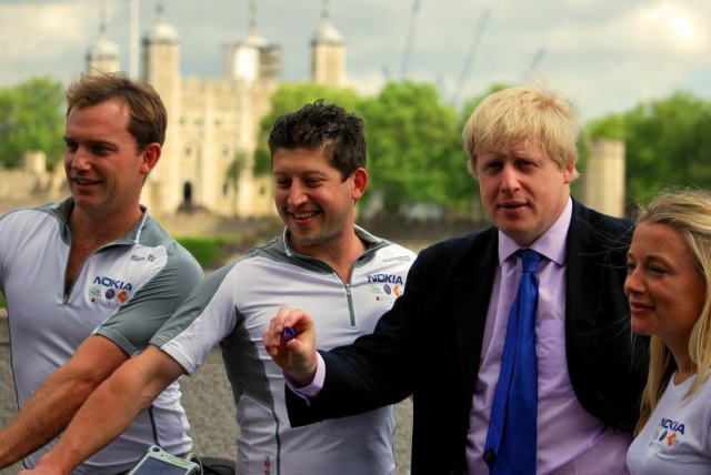 SolarCyclists Iain, Jamie and Susie with Boris Johnson as they set off on their journey 