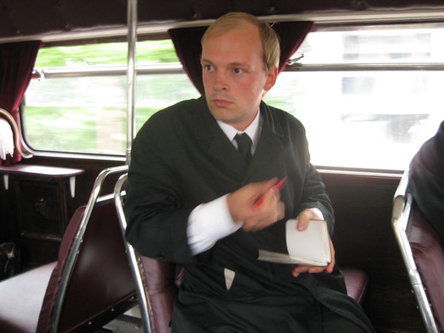 Mr Hinge makes some notes. 