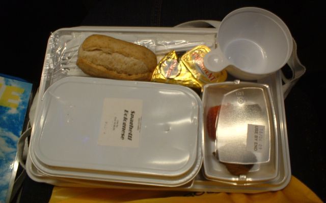 Spaghetti bolognese, bread roll, cheese, butter, chocolate cake at Plane Food Cafe 