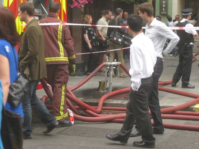 Closeup of watermains on Wardour Street. 