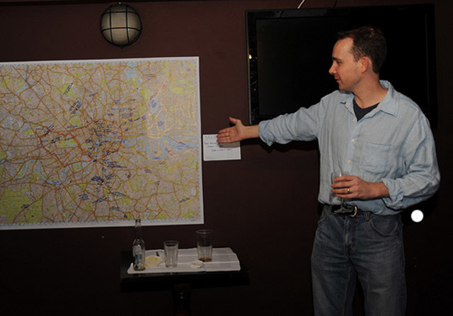 M@ introduces the map to a crowd of beered-up Londoners. Image by Tiki Chris. 