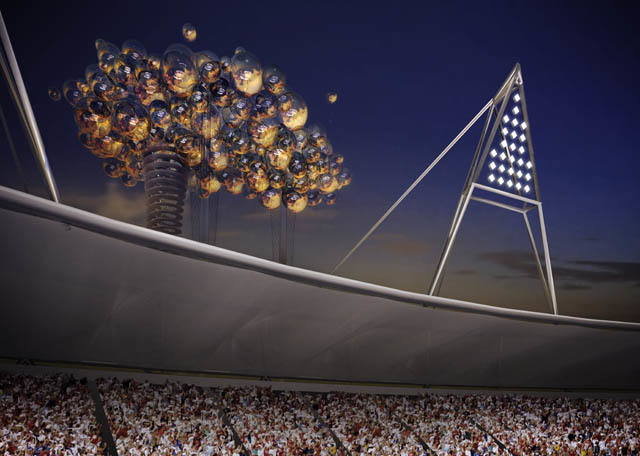 From inside the stadium, the cloud appears as a giant Olympic torch. 