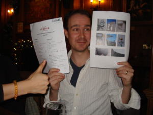 M@ shows off Team Londonist's completed answer sheet