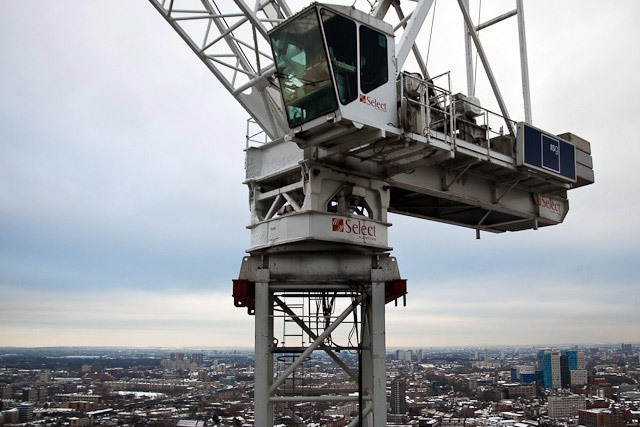 A cranes-eye view of east London. The Olympic stadium is just about visible to the left of the crane