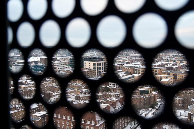 View through the perforated window screen towards Guardian HQ at Kings Place