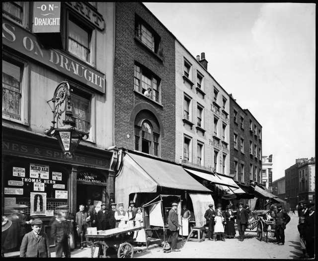 View of the north side of Earlham Street, looking east with Seven Dials in the background.