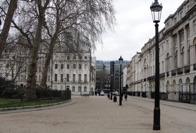 Perowne and his family live on the north side of Fitzroy Square: "above him the chandelier's glass pendants tinkle and chime to the vibrations of the Victoria line tube train far beneath the house slowing into Warren Street station." p.65