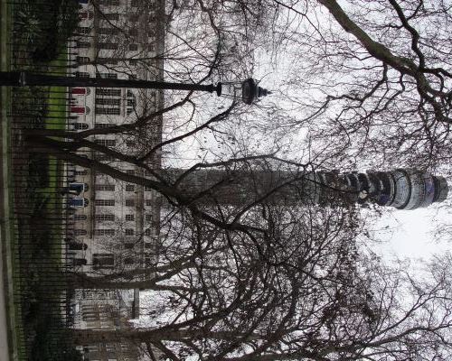 Fitzroy Square: "That particular faÃ§ade is a reconstruction, a pastiche... and right behind is the Post Office Tower, municipal and seedy by day, but at night, half-concealed and decently illuminated, a valiant memorial to more optimistic days." p.4