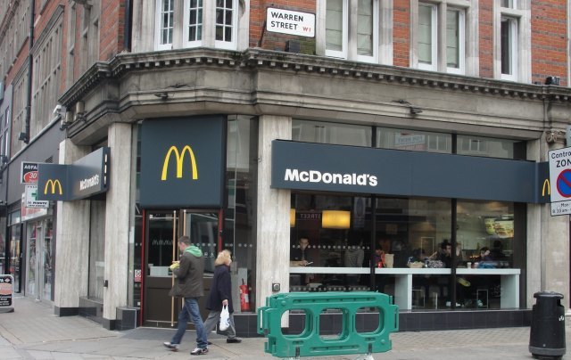 "it's still possible to see a makeshift bookstall and a hot-dog stand, cheekily set up right outside McDonald's on the corner." p.72