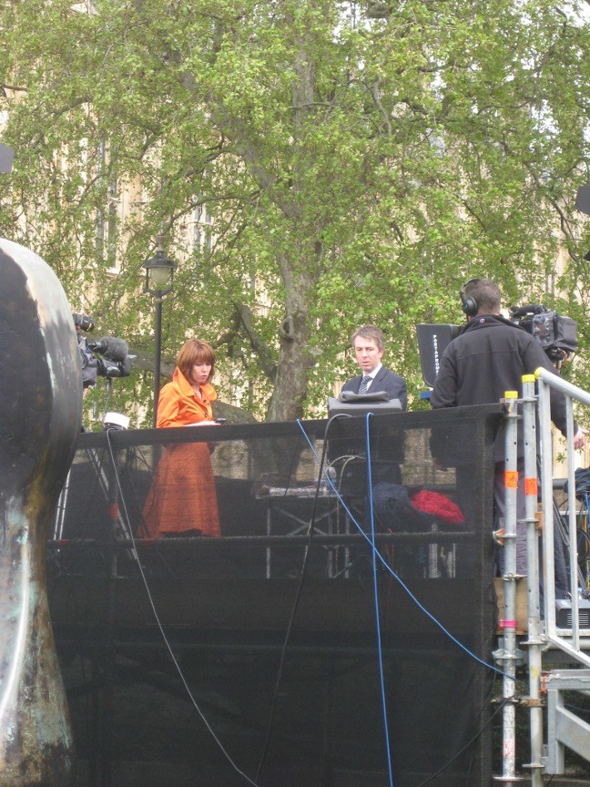 Kay Burley on Sky News' sole, uncovered, platform for the station's marathon coverage. The station's Jeremy Thompson had to get his umbrella out when it started to rain at 5pm.