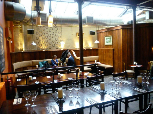 The restaurant area with horseshoes on the wall to remind you of its history