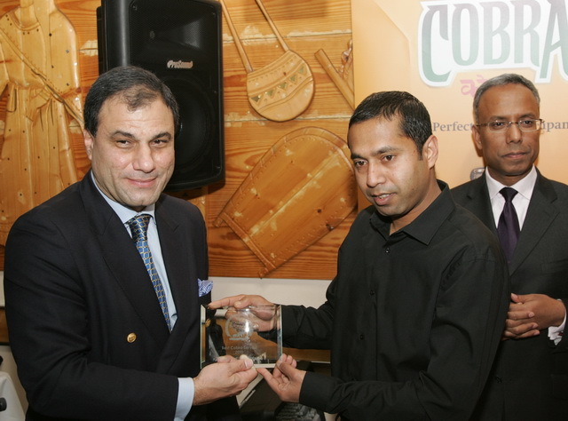 Lord Karan Bilimoria presents the award for (appropriately) the best Cobra served on Brick Lane.