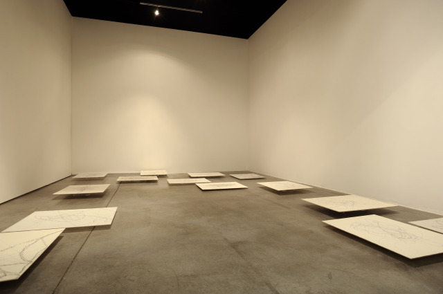 Alexandra Handal has repeatedly written the names of vanished Palestinian villages onto card, separated out by region.