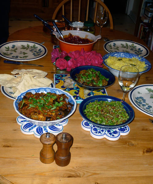 An impressive spread: Thoran and aubergine curry in the foreground, Bothi Gosht, turmeric rice and spiced beetroot behind. And ooh, look at those poppadoms!