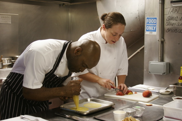 Gary &amp; Alice Hall (pastry chef at the Ivy) work on the blush peach and almond tart.
