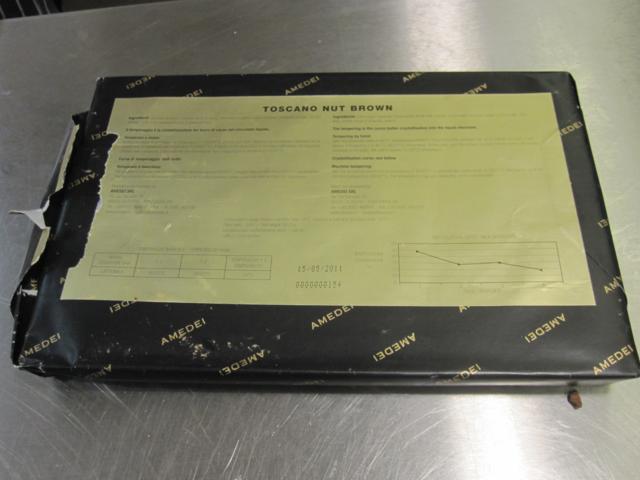 The chocolate arrives from Italy in 1kg blocks like this which are available for sale at William Curley.
