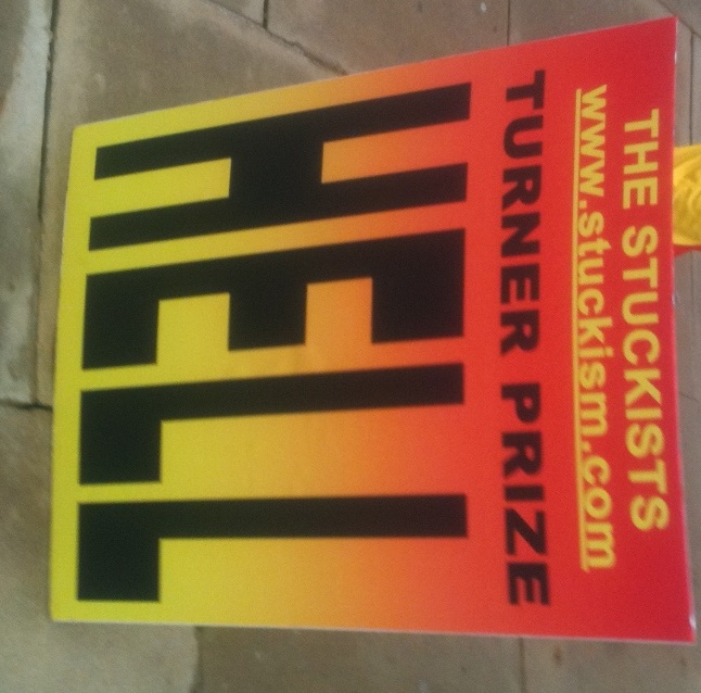 A protest placard. No words minced.