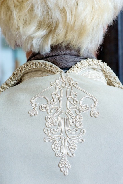 An immaculately-dressed Tod Lynn guest waits for the show to start.  Embellishments seem to be a big story for both the designers and those in the know arriving for the shows.