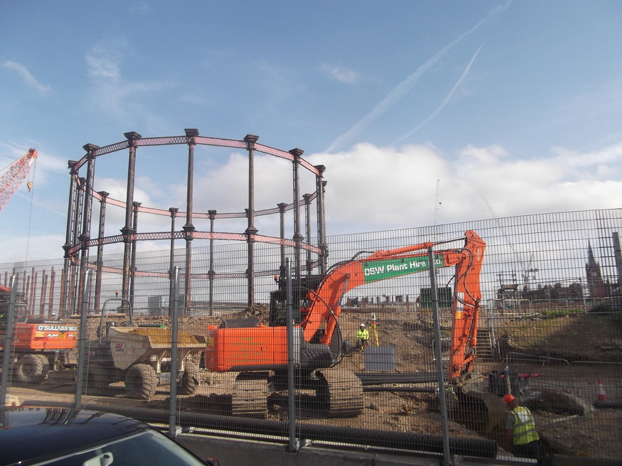 Sections of old gasometers, in storage at this site for years, are now being relocated for eventual reassembly.