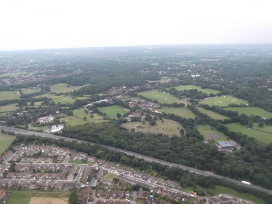 Pick a field, any field. There's no designated landing spot, so we just pick the best looking spot. We ended up in the one on the right shoulder of the triangle ahead.