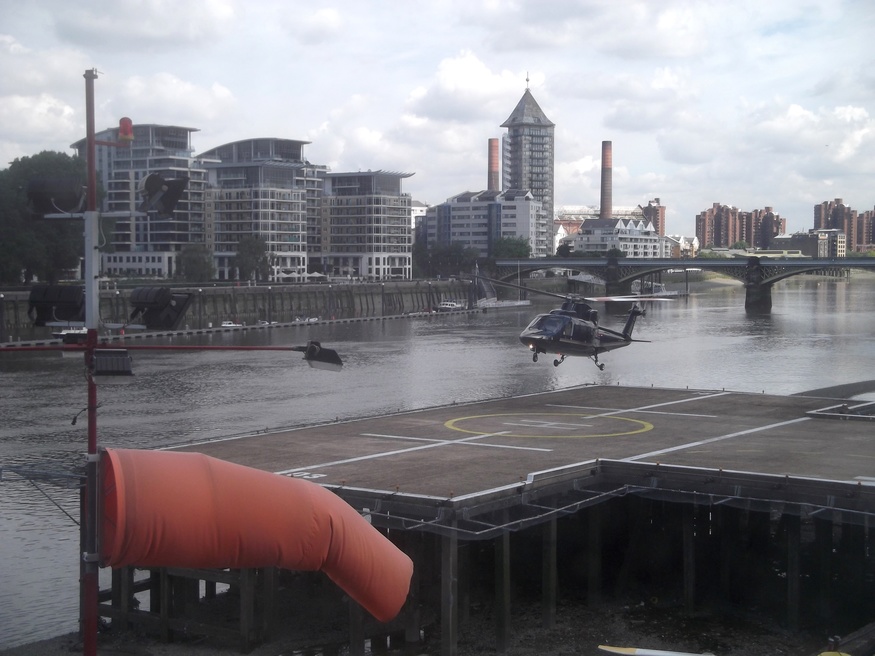 A helicopter landing at Battersea.