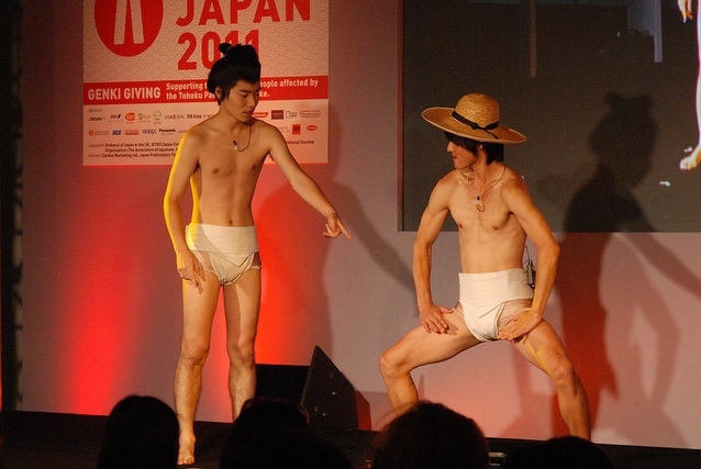 Comedy duo JaruJaru demonstrating sumo shiko / photo by Tom Royal