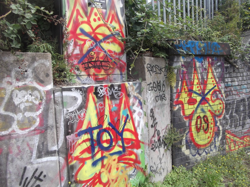 A trio by Tek33, tagged over, possibly by Tox.