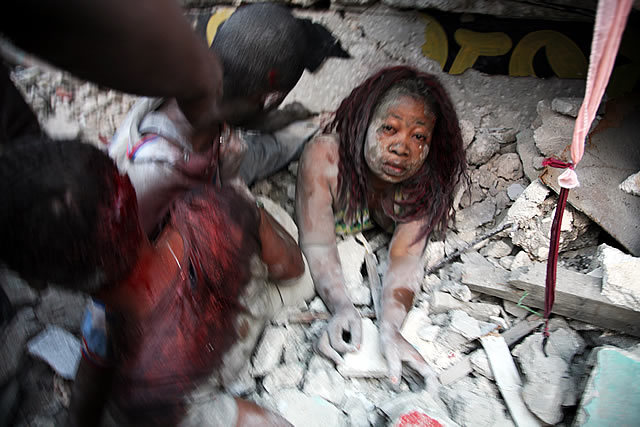 2nd Prize Spot News Single: Daniel Morel, Haiti. Rescue of a woman trapped under earthquake rubble, Port-au-Prince, 12 January