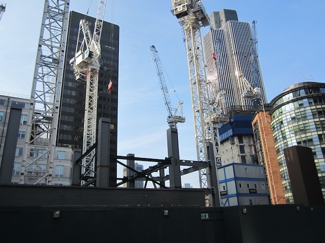 The Cheese Grater begins to rise. The stalled Pinnacle can be seen in the background.