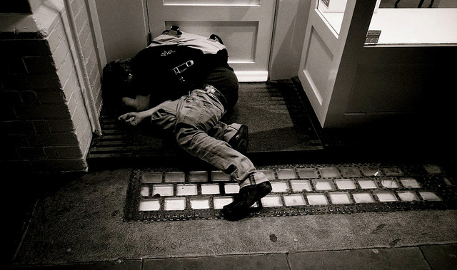 Drunk in a doorway, by dominica69