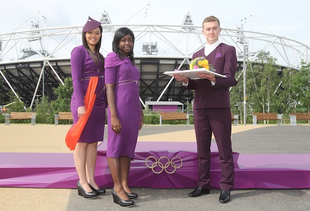 Victory Ceremonies Podiums, Ceremonial Costumes And Floral Bouquets Revealed. Pictured are Gamesmakes, Jodie Rodaway (Presenter Escort with hat), Hilda Kwafo-Akoto (Athlete Escort), Matt Smith (Medal & Flower Bearer). 

UNDER EMBARGO UNTIL 9.00AM JUNE 1ST