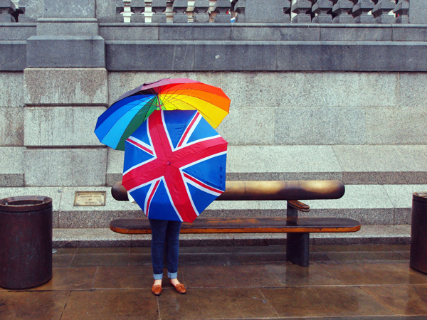 Two umbrellas, Trafalgar Square by Darren Lehane