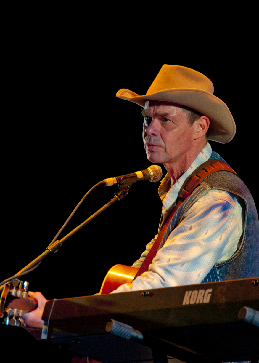 American comedian and TV star Rich Hall plays to a soggy Applecart festival in east London's Victoria Park