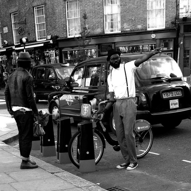 Hipster Boris biking, by Linda Wisdom