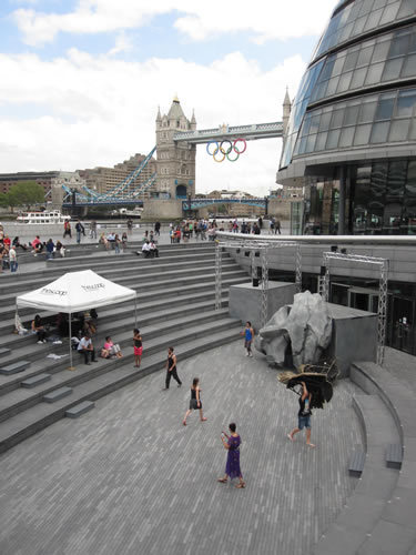 Rehearsing in the Scoop with Tower Bridge in the background