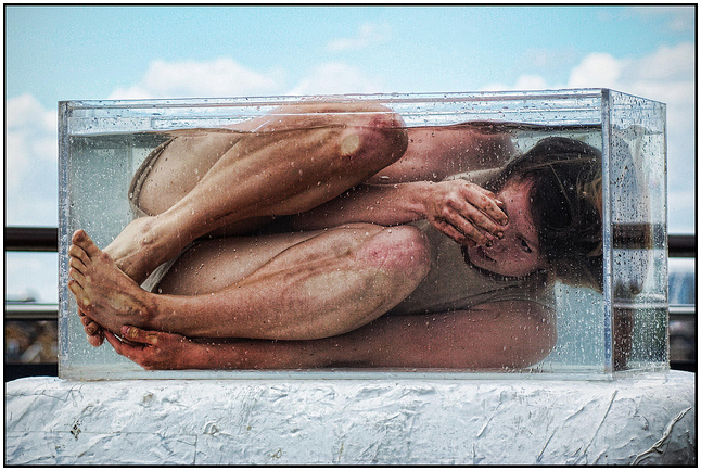 Seasaw by Tilted - Maresa von Stockert douses her dancers in tanks of water in a promenade performance / photo by Carolus Darwin