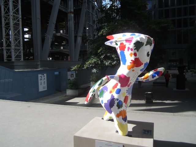 Splashy Mandeville, outside the growing Cheesegrater Building.