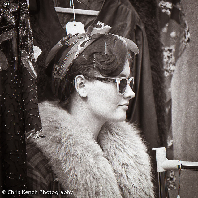 A stall-holder at Camden marketing, by Chris Kench