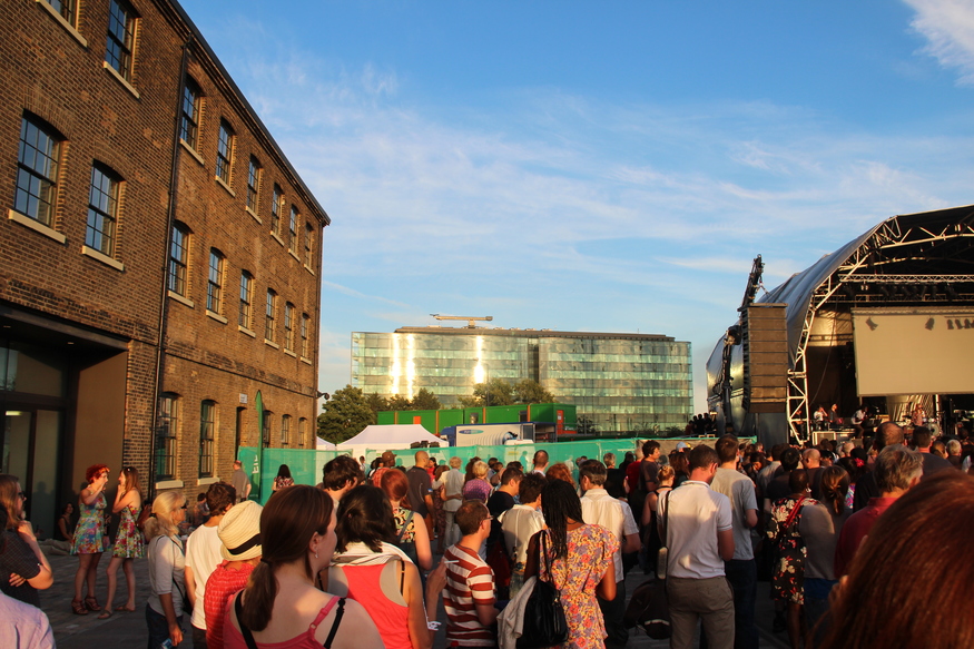 By the stage - Central Saint Martins College of Art &amp; Design to the left and Kings Place opposite