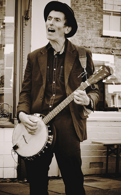 Banjo strumming, perfectly timed, by peterphotographic