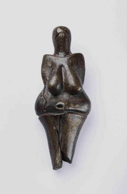 01172519: Modelled figure of a mature woman from Dolni Vestonice, the oldest ceramic figure in the world; On loan from Moravske Zemske Museum. Brno.