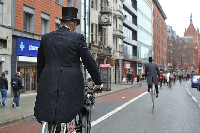 Two penny farthings heading towards Chancery Lane station in the rain (which had just started to spit).