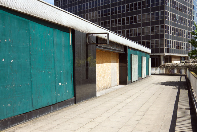 The former site of Young Bin, or Young Bean, a Korean restaurant on St Alphage Highwalk. Here's the restaurant in happier times, and here's the interior. Behind it is St Alphage House