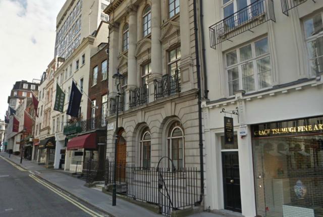 Book 1 Ch. 1 Duke Street St James's, where Twemlow lives "over a livery stable yard". Photo from Google Streetview.