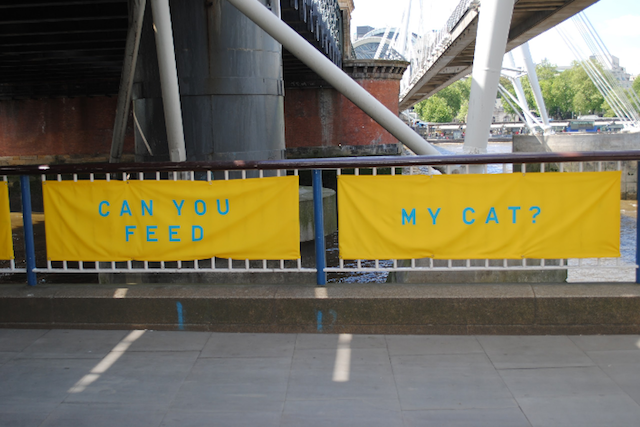 Artist Bob and Roberta Smith has created a series of yellow banners promoting neighbourliness.